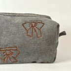 Reva Bow Corduroy Pouch Bag